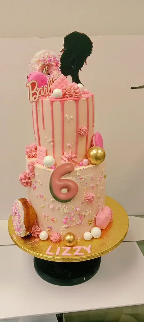 Doll themed celebration cake