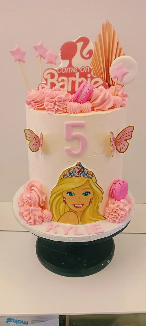 Doll themed celebration cake