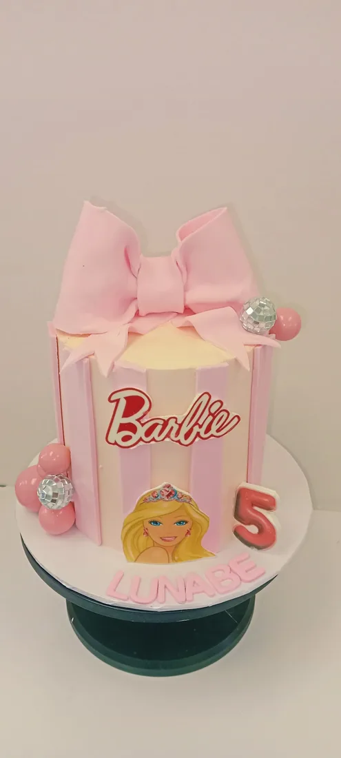 Doll themed celebration cake
