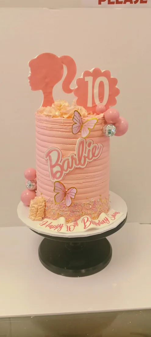 Doll themed celebration cake