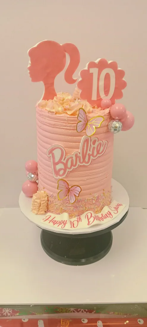 Doll themed celebration cake