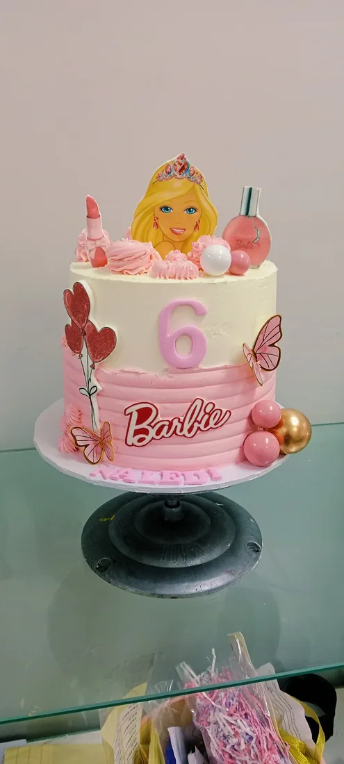 Doll themed celebration cake