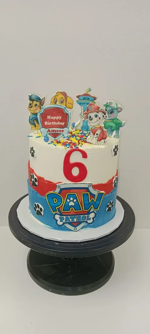 Cartoon character celebration cake