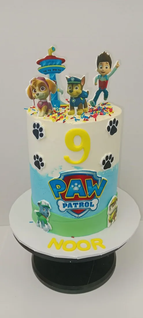 Cartoon character celebration cake