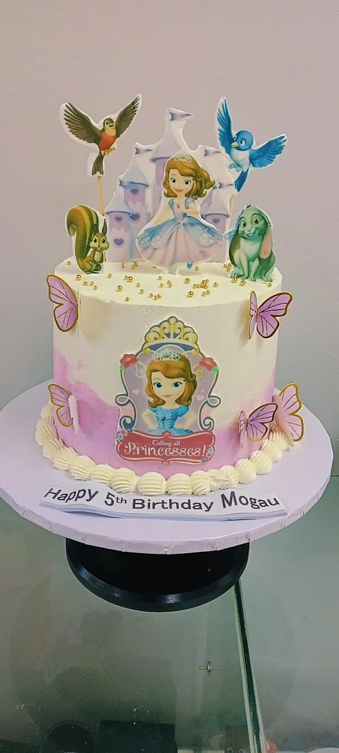 Cartoon character celebration cake