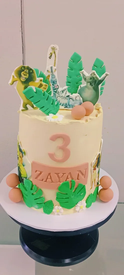 Cartoon character celebration cake