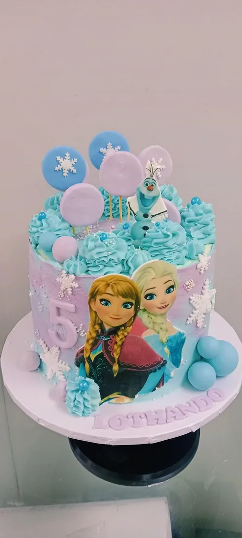 Cartoon character celebration cake