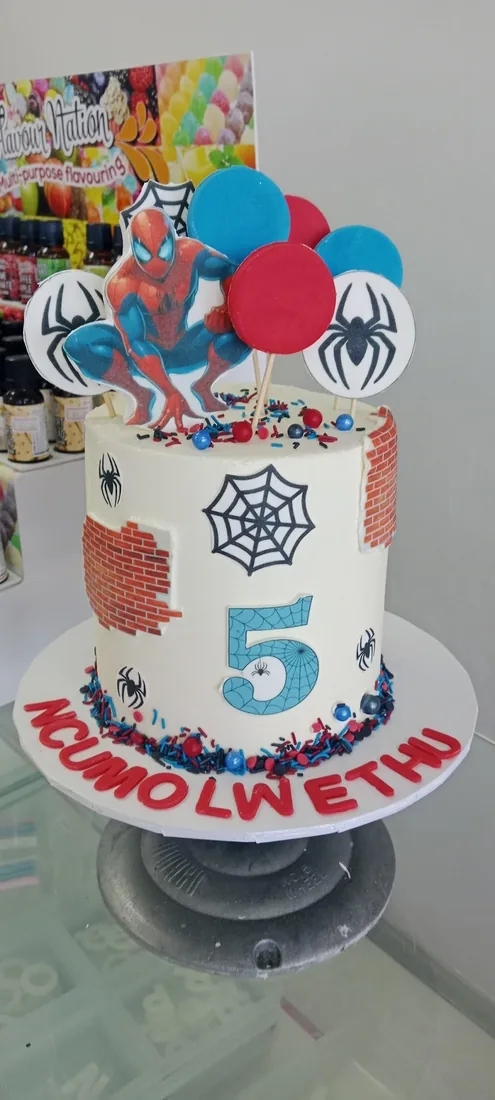 Superhero themed celebration cake