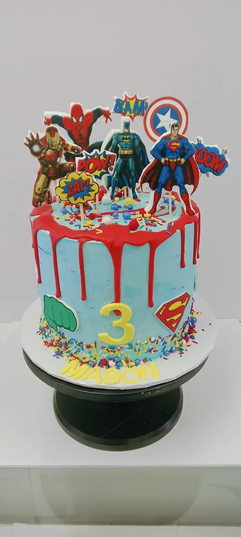Superhero themed celebration cake