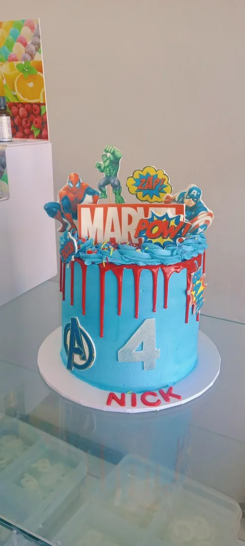 Superhero themed celebration cake