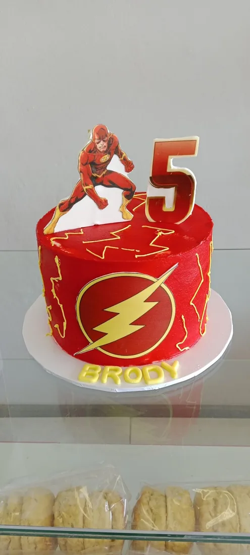 Superhero themed celebration cake