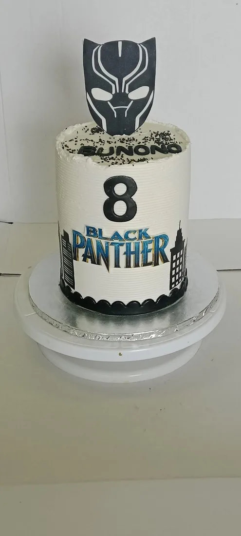 Superhero themed celebration cake