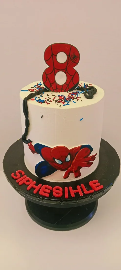 Superhero themed celebration cake