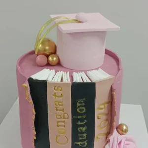 Pink and Navy Book Stack Graduation Cake